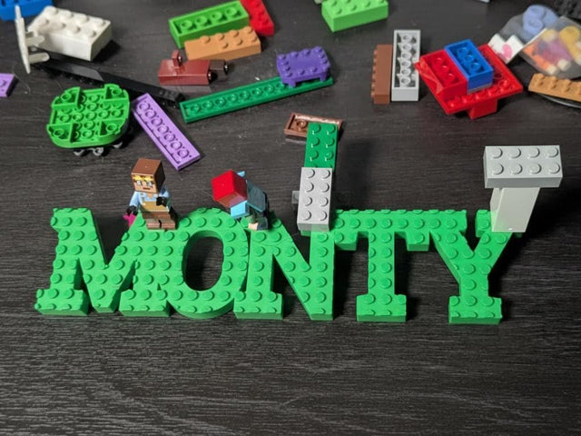 Bricks Name Sign: Building brick Compatible Wall Sign with keychain!, shown in the main close-up listing view with its overall design visible.