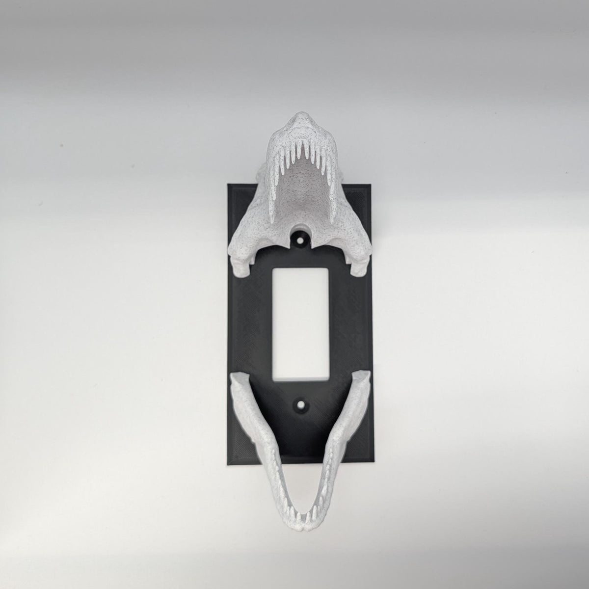 Dinosaur Skull Light Switch Cover, T-Rex Fossil Decor, shown in an additional close-up listing view with visible shape and details.