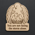 Front close-up of Protective Bird Wood Plaque Encouragement Quote Sign Comforting Birch Wall Art With Nest, showing dark engraving on natural birch wood.