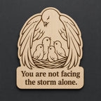 Front close-up of Protective Bird Wood Plaque Encouragement Quote Sign Comforting Birch Wall Art With Nest, showing dark engraving on natural birch wood.