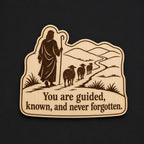 Front close-up of Shepherd Wood Plaque Guided and Known Quote Sign Inspirational Birch Wall Art With Sheep, showing dark engraving on natural birch wood.