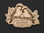 Front close-up of Sparrow Quote Wood Plaque Never Overlooked, showing dark engraving on natural birch wood.