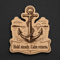 Front close-up of Anchor Wood Plaque Hold Steady Quote Sign Nautical Birch Wall Art With Calm Water Scene, showing dark engraving on natural birch wood.