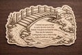 Front close-up of Inspirational Bridge Birch Plaque Encouraging Wall Art, showing dark engraving on natural birch wood.