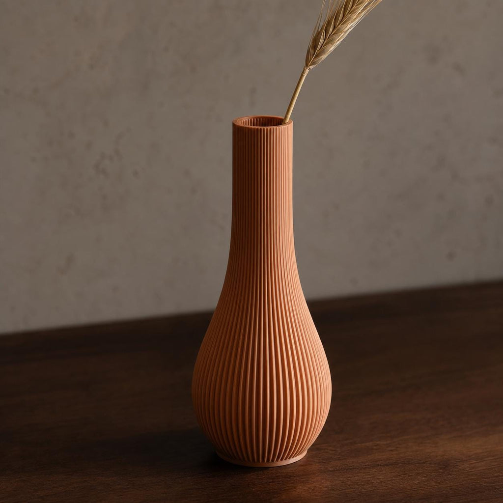 Close-up of the Terracotta Serein bud vase showing its fine vertical ribbed texture