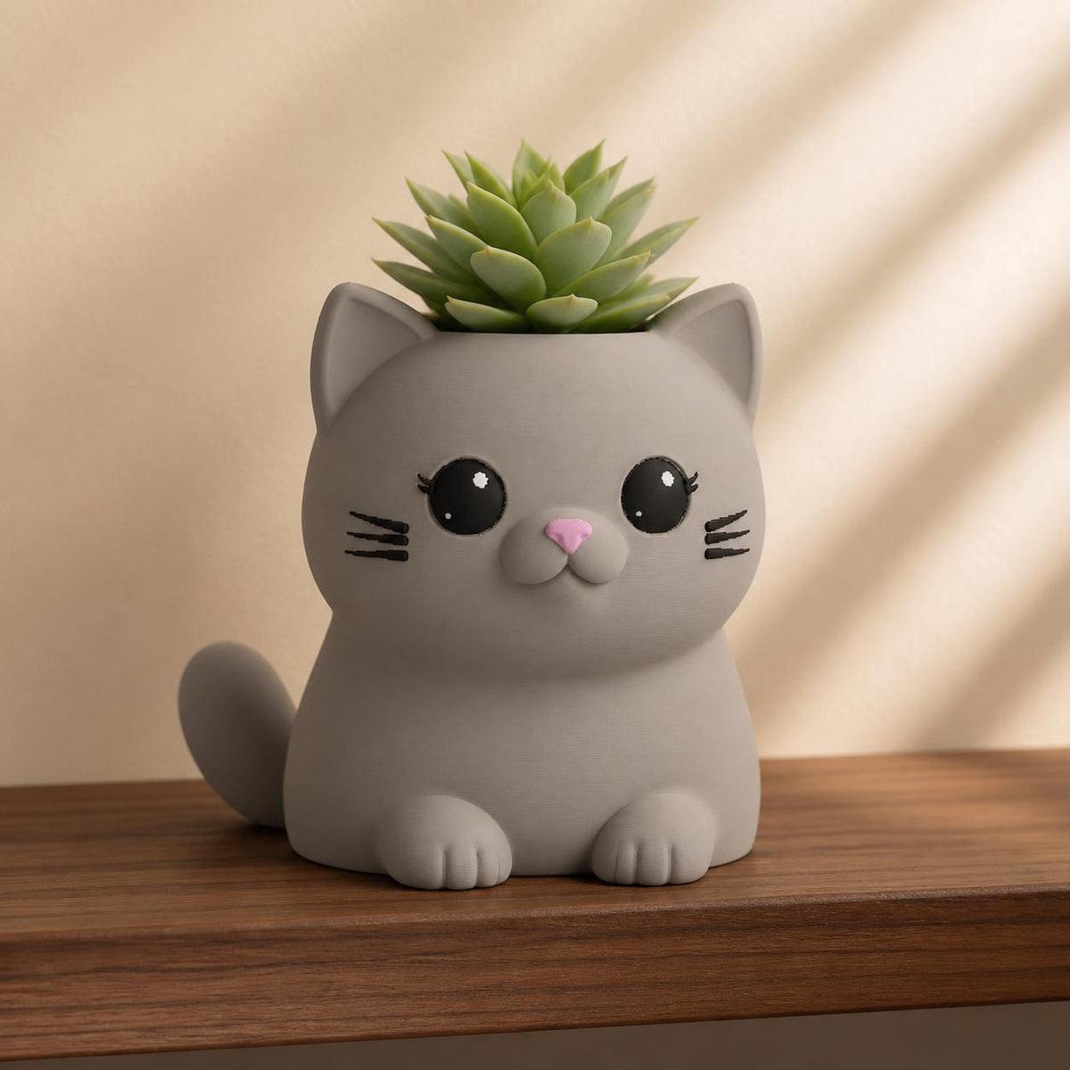 Close-up lifestyle view of the Whisker Sprout cat planter in Latte Brown