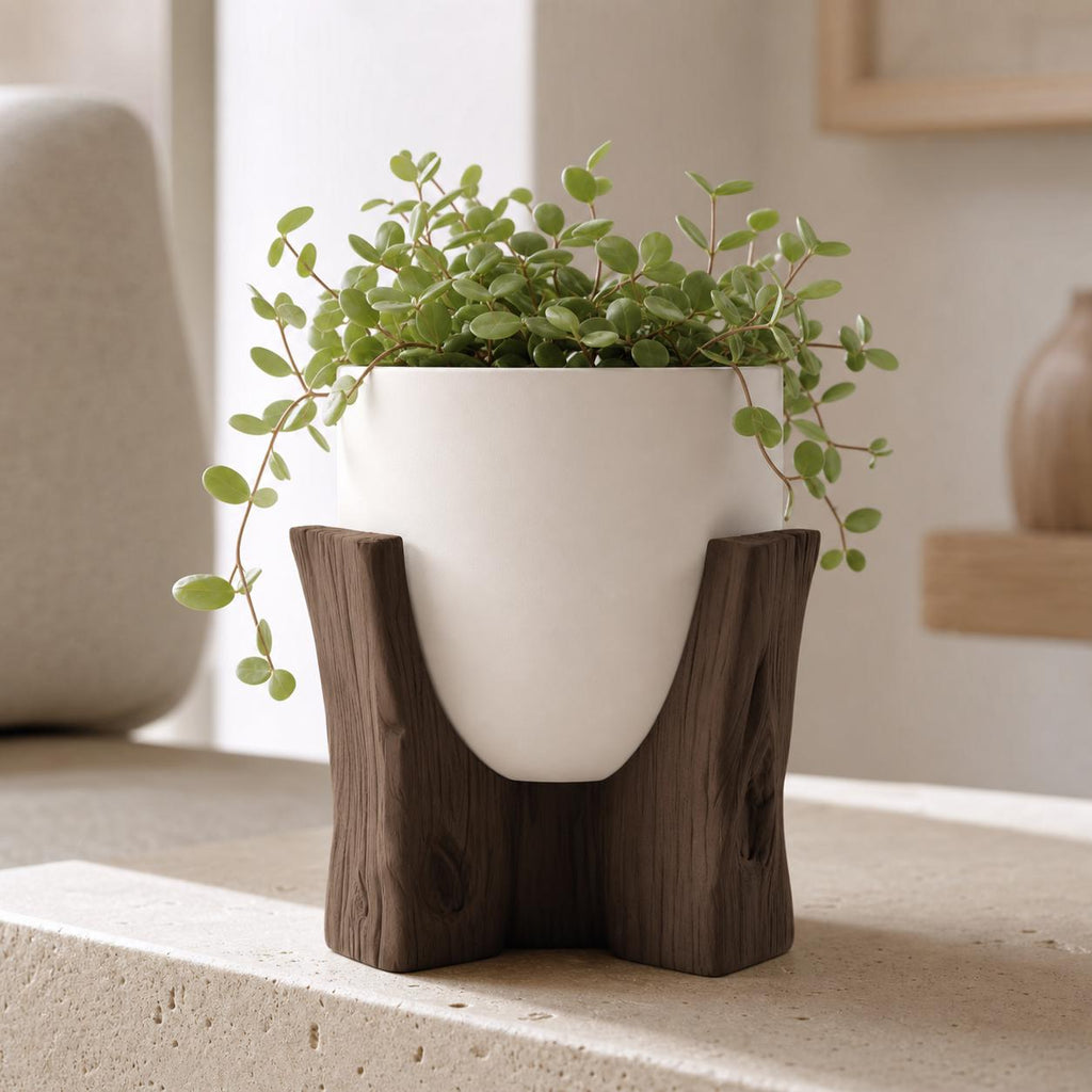 Close-up of the complete Hearthgrain smooth Bone White planter in its Dark Brown tripod stand