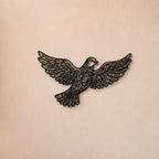 Close-up of Flying Bird filigree wall art in black at accurate 12-inch scale