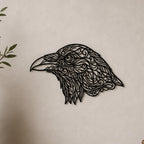 Close-up of Raven Head filigree wall art in black at accurate 12-inch scale