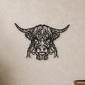 Close-up of Highland Cow filigree wall art in black at accurate 12-inch scale