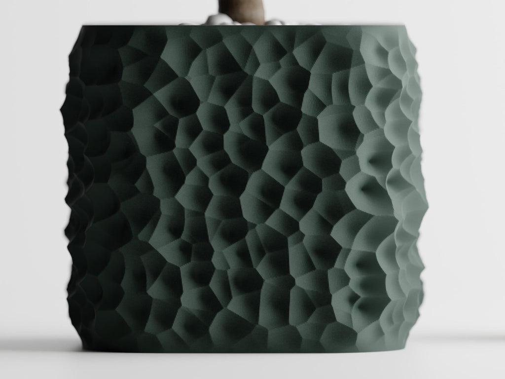 Front close-up of the StoneCell planter showing its rounded square silhouette