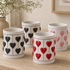 Close-up group scene showing all four Heartloom colorways together from varied angles