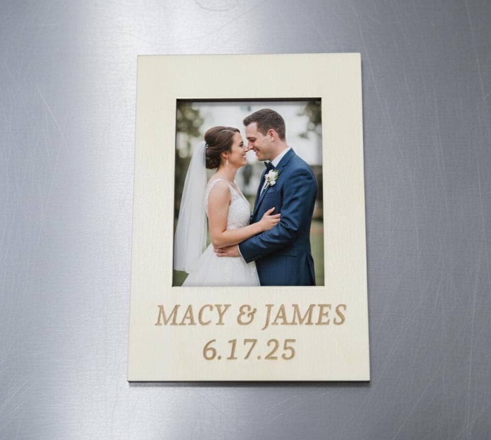Personalized engraved birch mini photo frame magnet displaying a wedding portrait on a neutral tabletop.