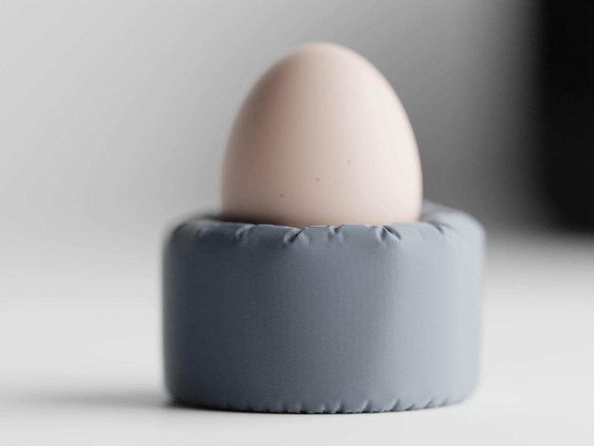 Front close-up of the PillowNest egg cup in cool gray