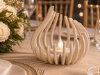 Beige FlareNest flameless centerpiece on a romantic sweetheart table