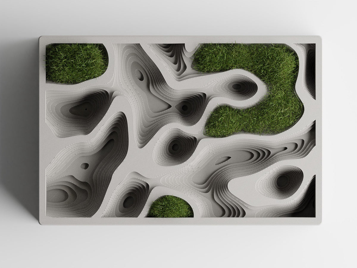 Overhead view of the ContourCove tray styled with dry green moss in selected recessed areas