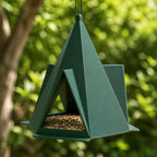 Forest Green Foldcrest Haven geometric hanging bird feeder in a leafy garden
