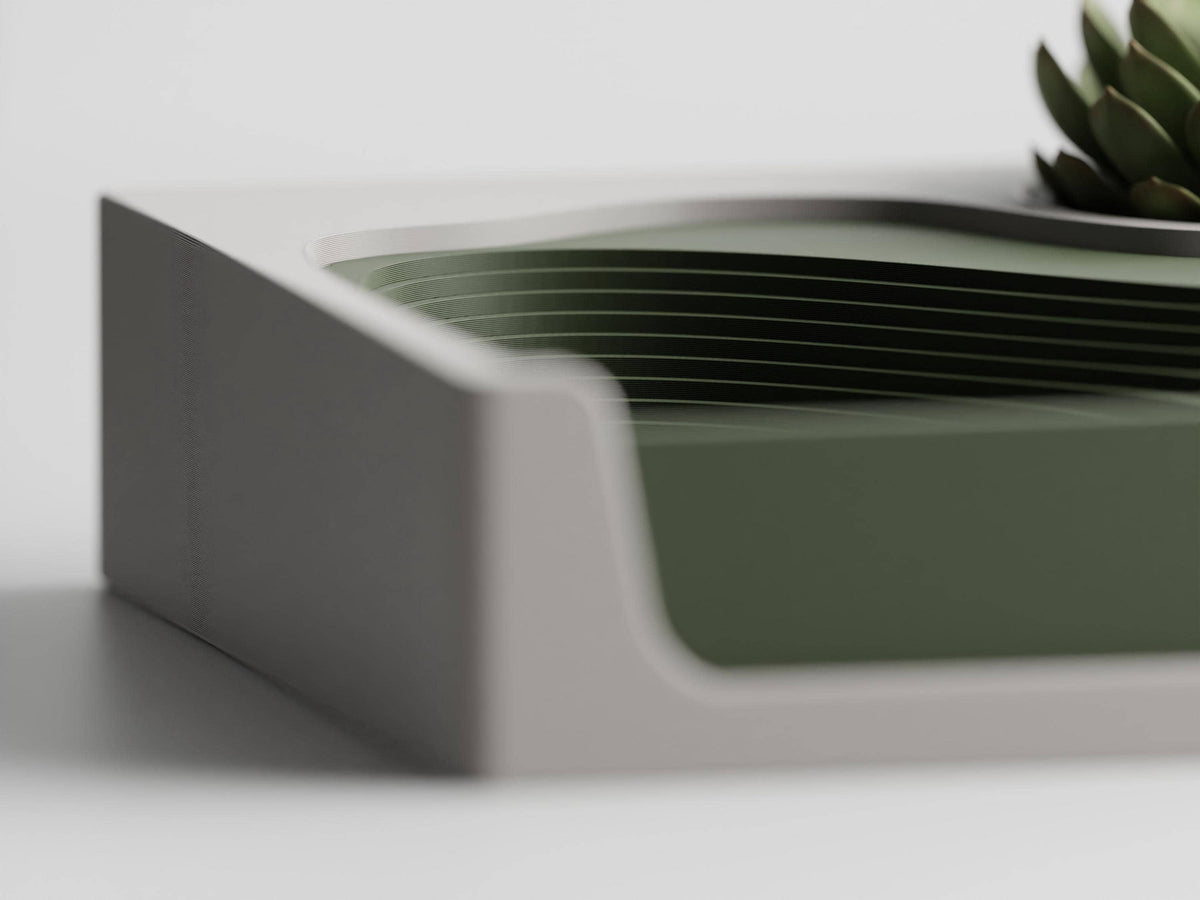 Left-side detail of the Woodland Ivory organizer's Dark Green layered landscape and Ivory White frame.
