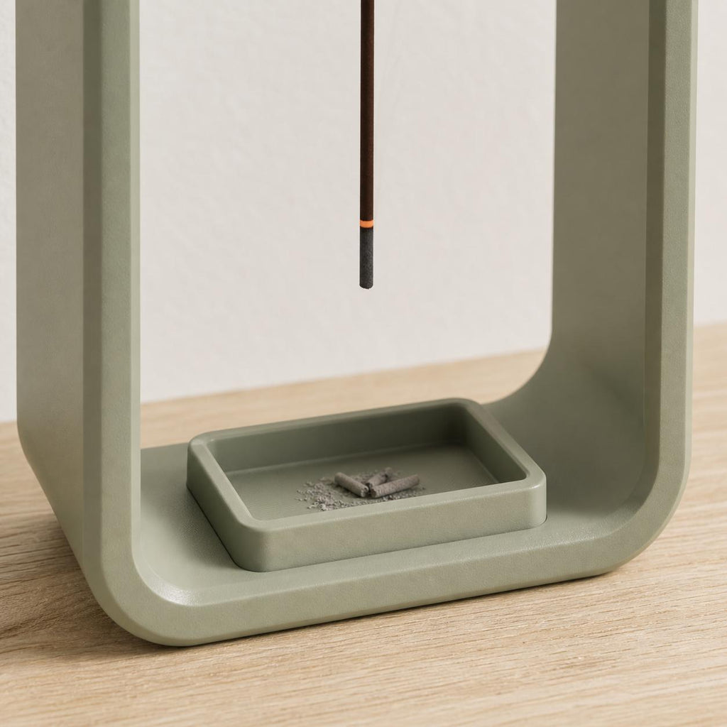 Close-up detail of the fitted ash tray inside a Green AeroCinder incense stand