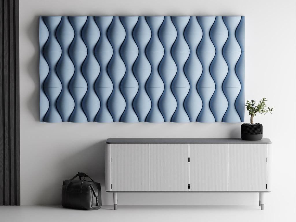 Close-up blue HaloWeave rounded relief tile arrangement mounted above a modern console