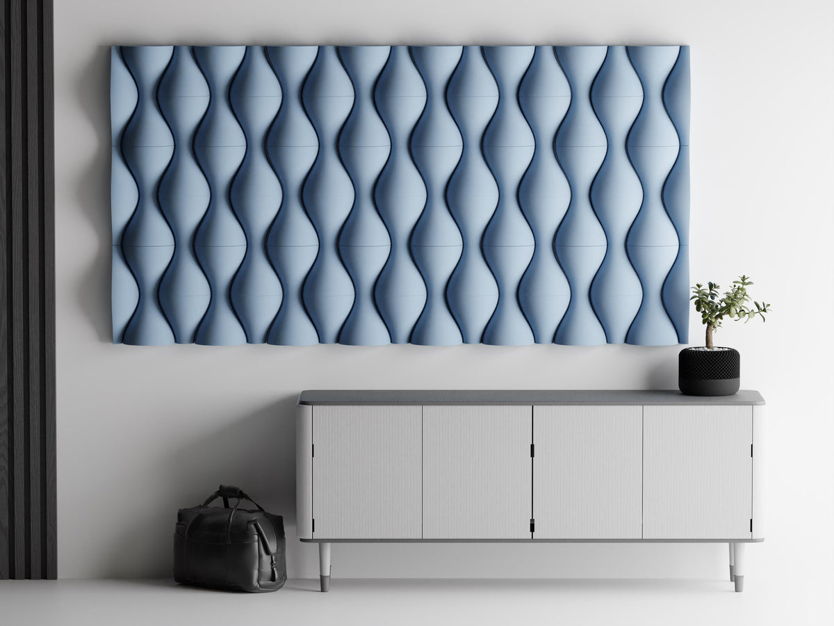 Close-up blue HaloWeave rounded relief tile arrangement mounted above a modern console