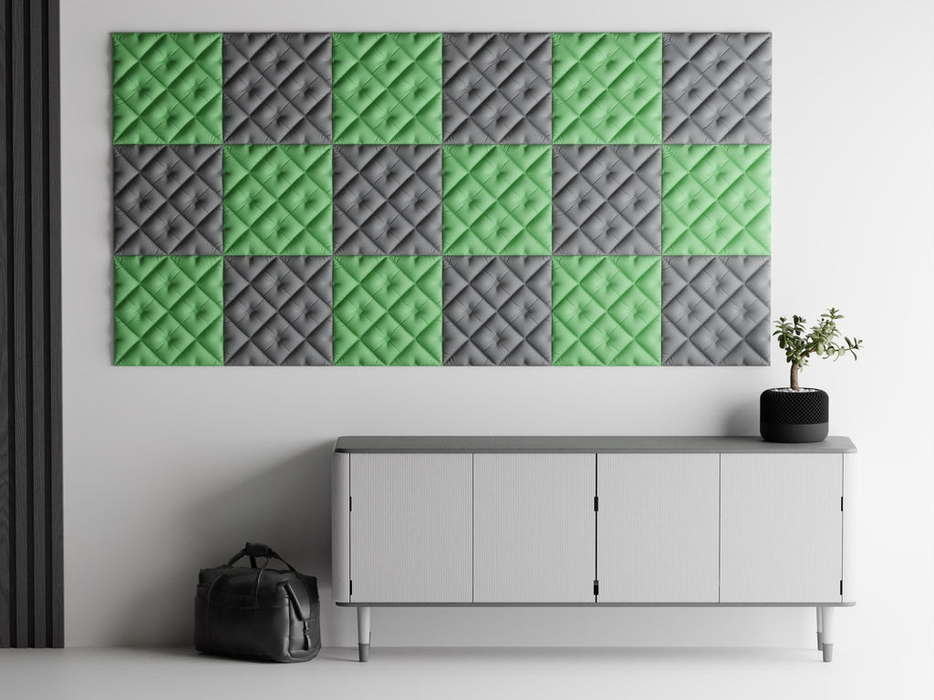 Close-up green and charcoal TuftWeave quilted tile arrangement above a modern console