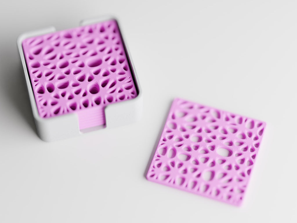 Angled close-up of the CanopyLace lace-like coaster openings and rounded square edges