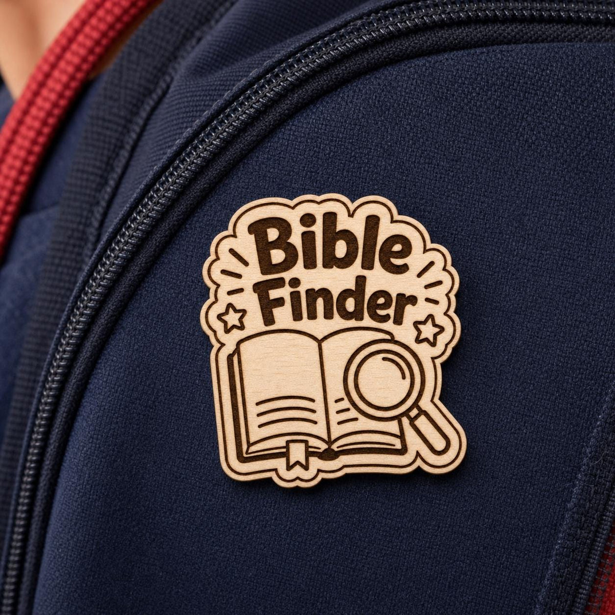 Page Scout Bible Finder engraved birch reward badge shown close up in a realistic meeting setting.