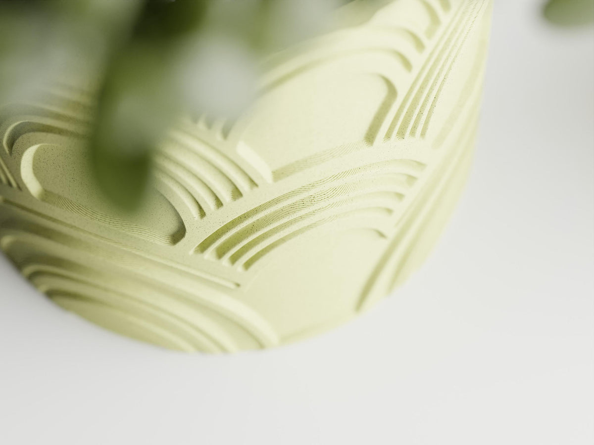Macro detail of the recessed fan-shaped channels on an ArcEcho planter