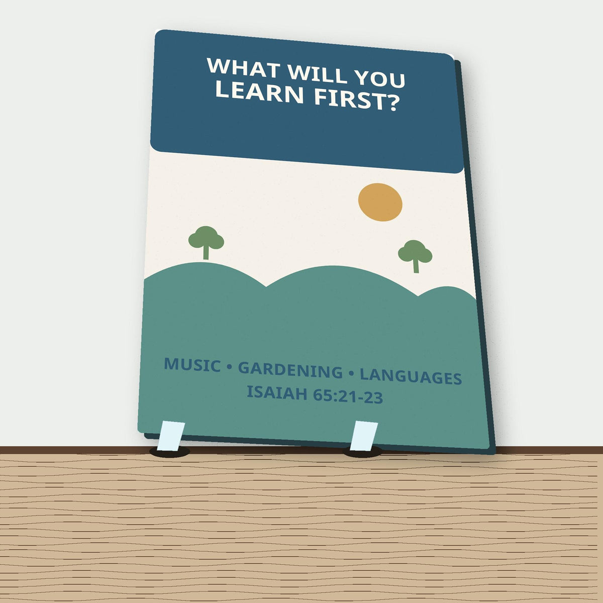 Learn Forever Hobby Guide flyer plaque shown close up from a distinct angled view in a realistic room setting.