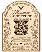 Meadow Connection Guest WiFi Sign engraved birch sign shown close up against a plain warm white background in natural birch and dark engraving with a complete QR code and sample guest network details.