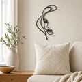 Elegant Woman Profile wall art in black, shown at 12-inch scale in a modern living room