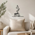 Coffee Cup wall art in black, shown at 12-inch scale in a modern living room