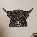 Close-up of Ornate Highland Cow filigree wall art in black at accurate 12-inch scale