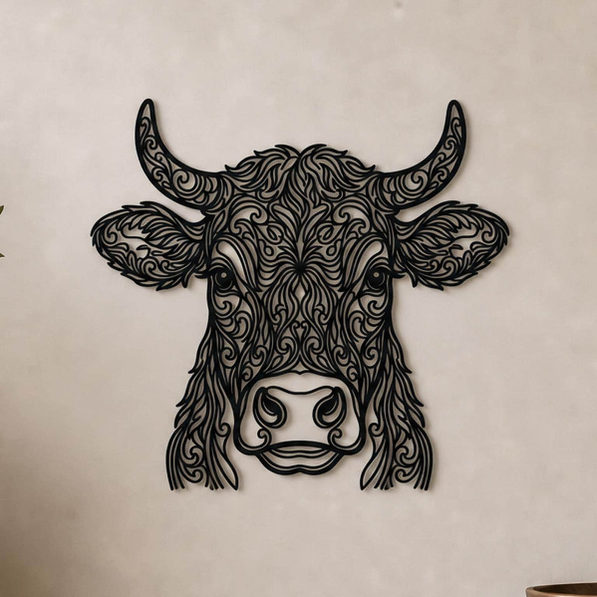 Close-up of Ornate Cow filigree wall art in black at accurate 12-inch scale
