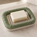 Close-up of FoldNest draining soap dish with Mistletoe Green ruched rim and Beige catch tray.