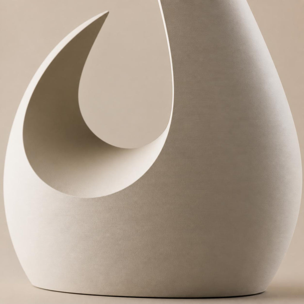 Macro close-up of the Solstice Arc vase crescent rim and fine Ivory White matte texture