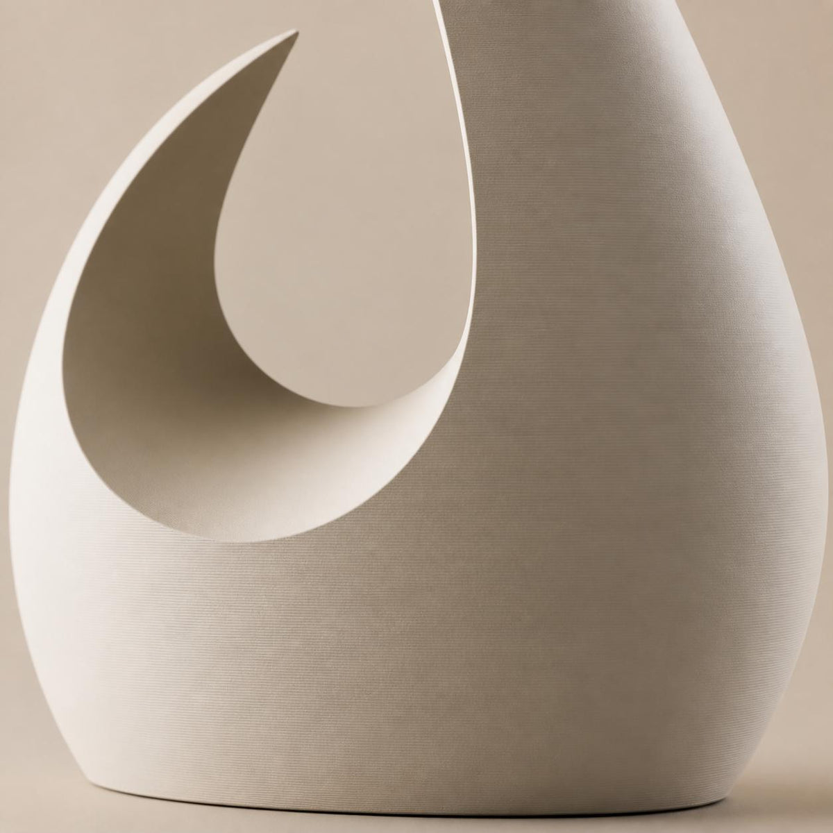 Macro close-up of the Solstice Arc vase crescent rim and fine Ivory White matte texture