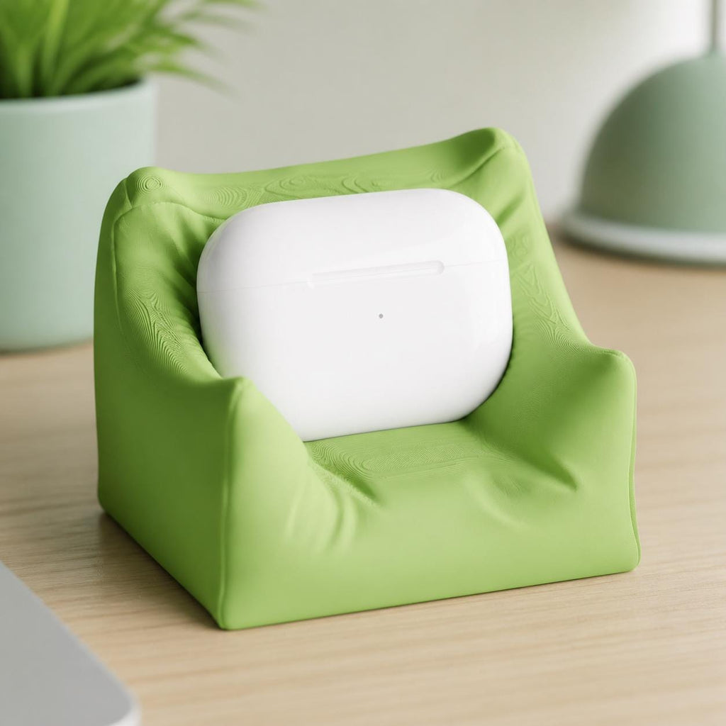 Close-up of the Apple Green PillowPod mini sofa stand holding an earbud charging case