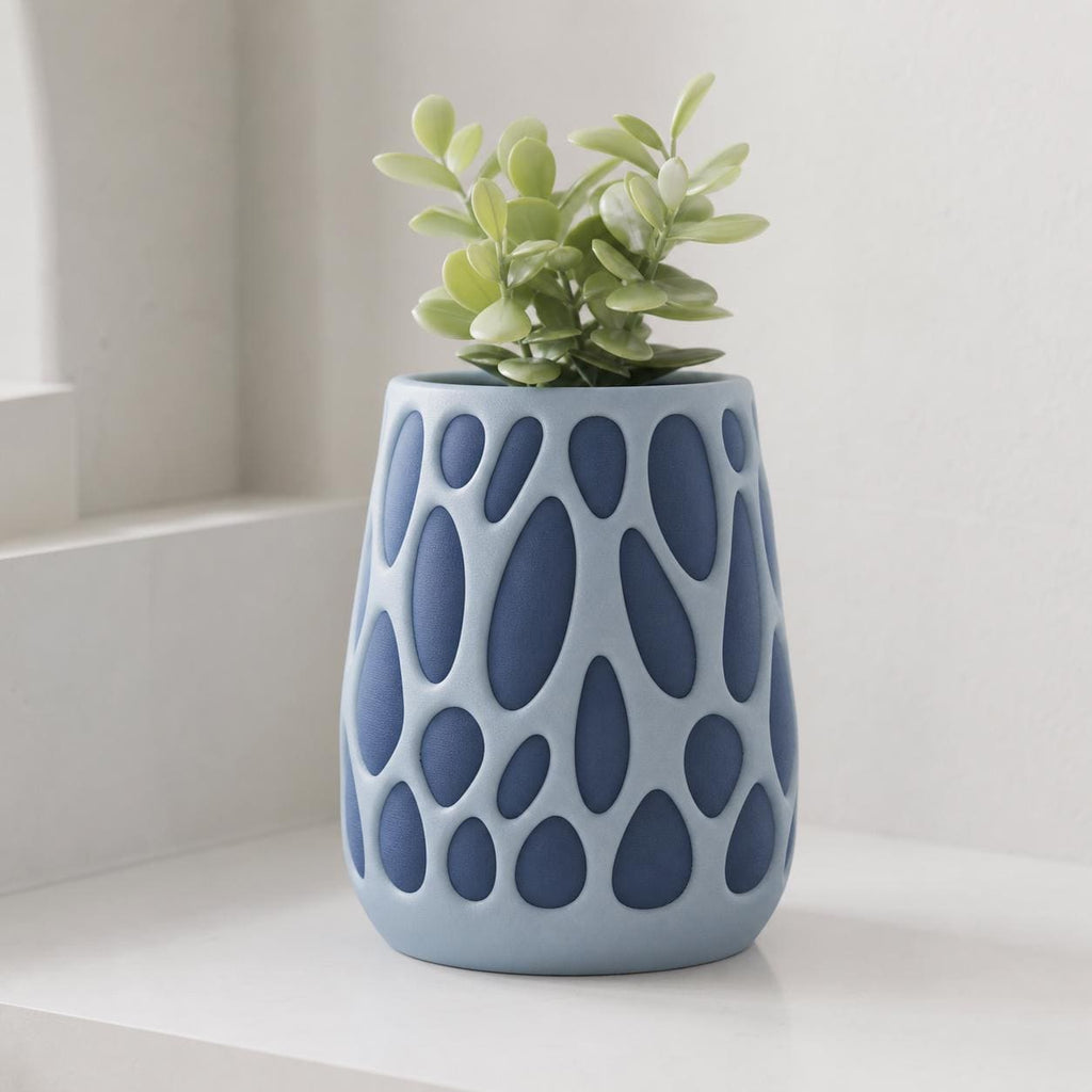 Bloomframe planter in Coastal Air with Ice Blue web and Marine Blue core