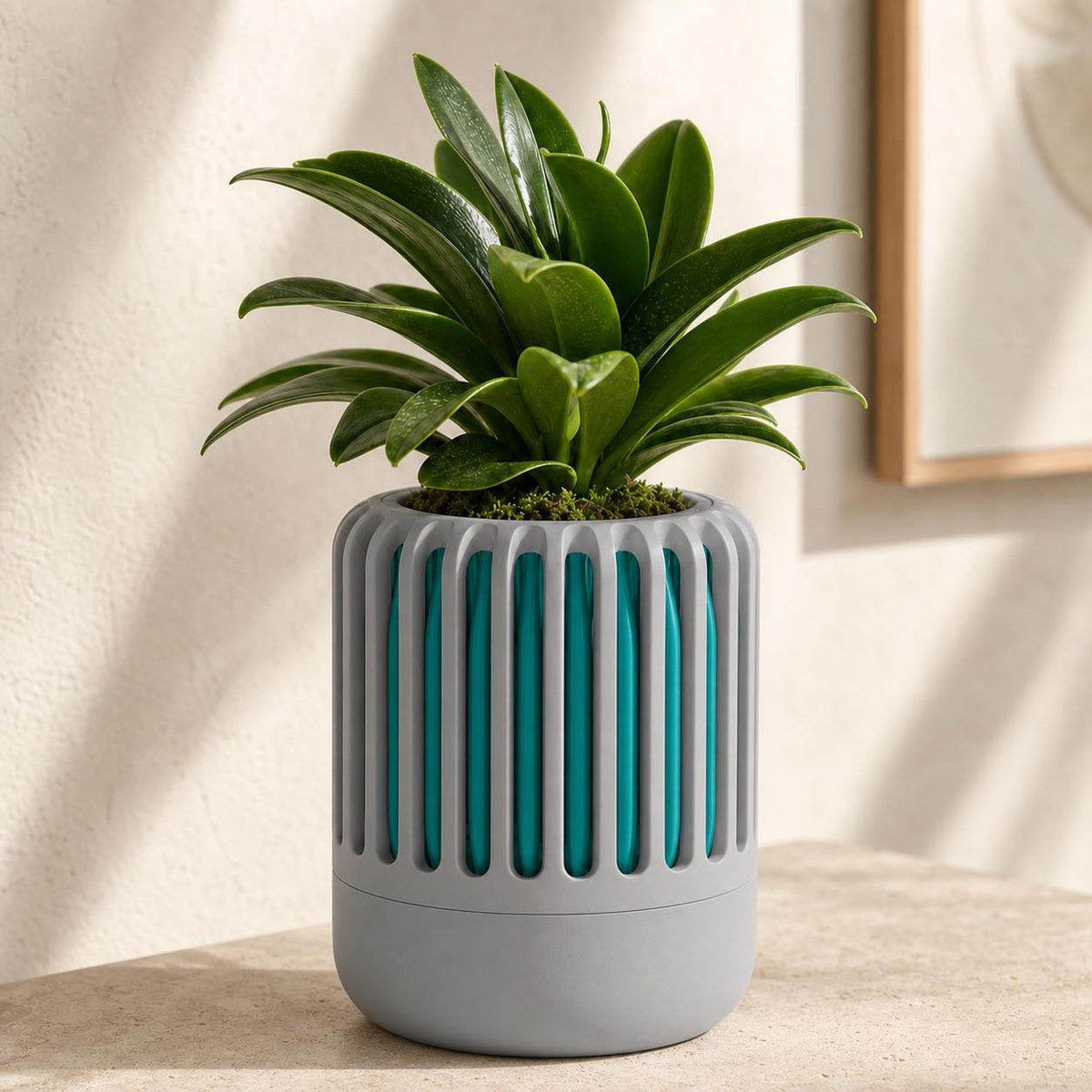 Close-up of the Airloom airflow planter in Blue Grey and Turquoise Tidal Mist colors