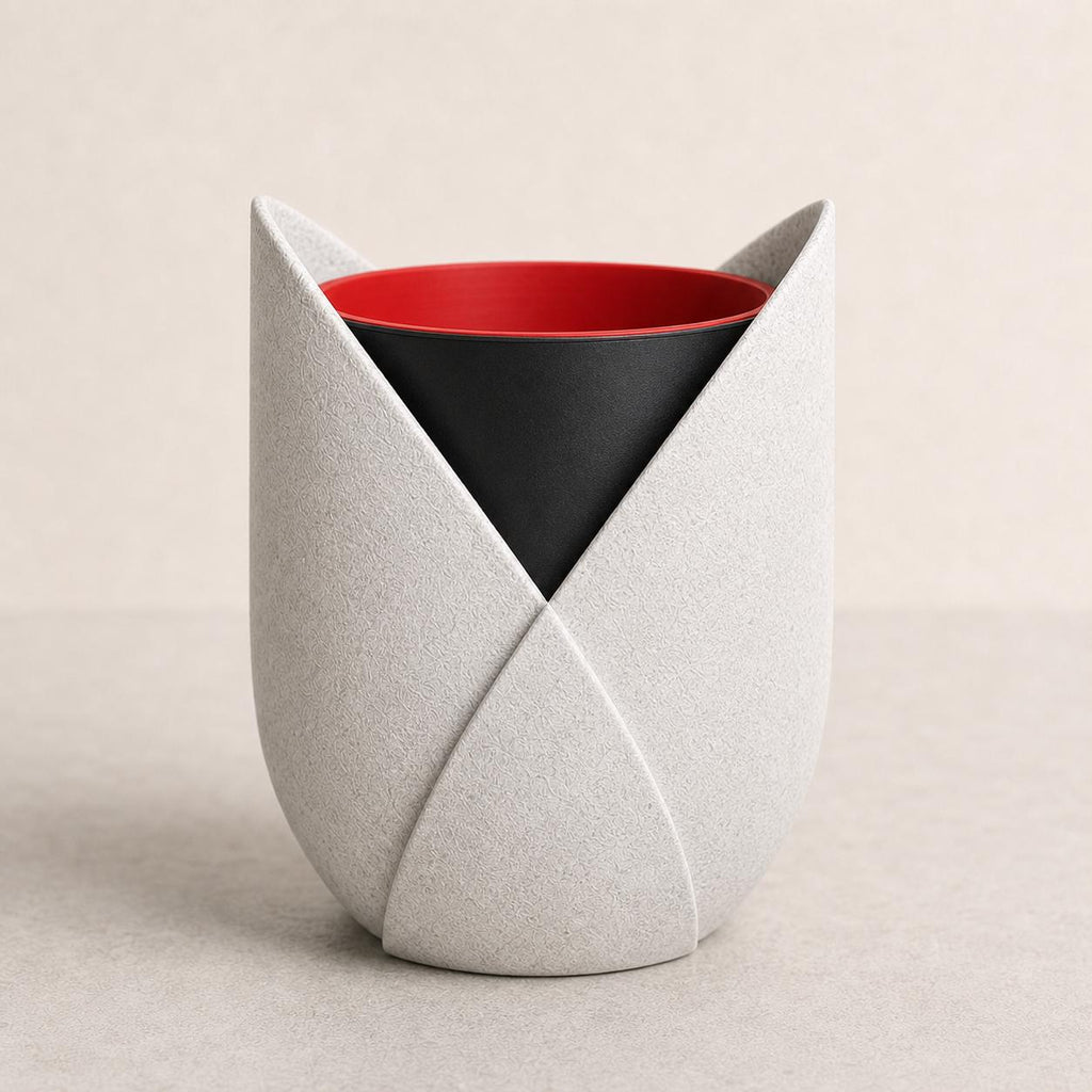 Close-up of the CrescentWrap planter in Marble White, Black, and Red