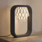 Latticefall ambient frame lamp with Charcoal base, Bone White shade, and USB LED glow