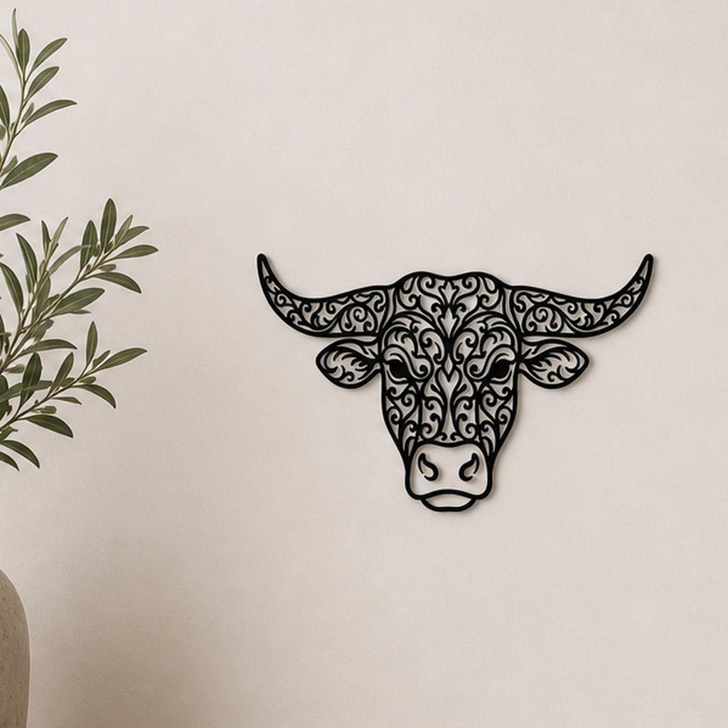 Close-up of Cow Portrait filigree wall art in black at accurate 12-inch scale
