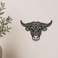 Close-up of Cow Portrait filigree wall art in black at accurate 12-inch scale