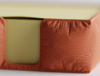 Close-up of the GatherPad holder's gathered fabric-look plastic surface