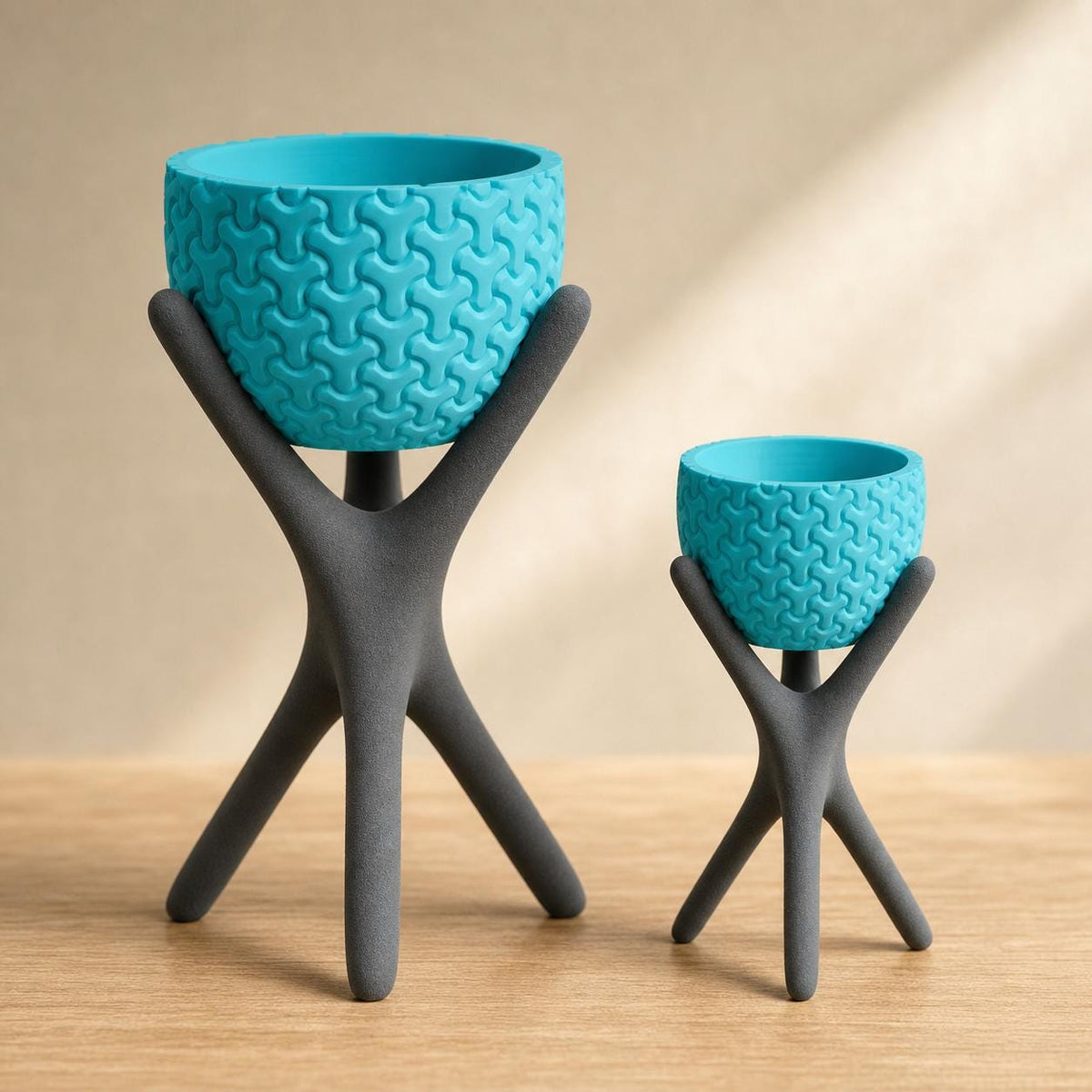 Close-up comparison of Large and Small AeroNest planters in Dark Grey and Turquoise