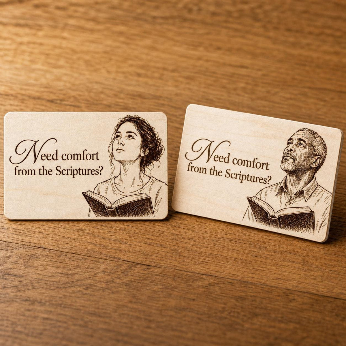Quiet Harbor Comfort Contact Cards showing both engraved birch reading artworks in a close-up tabletop view.