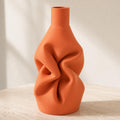 Terracotta DrapeForm Gathered Fold sculptural vase in a close three-quarter view