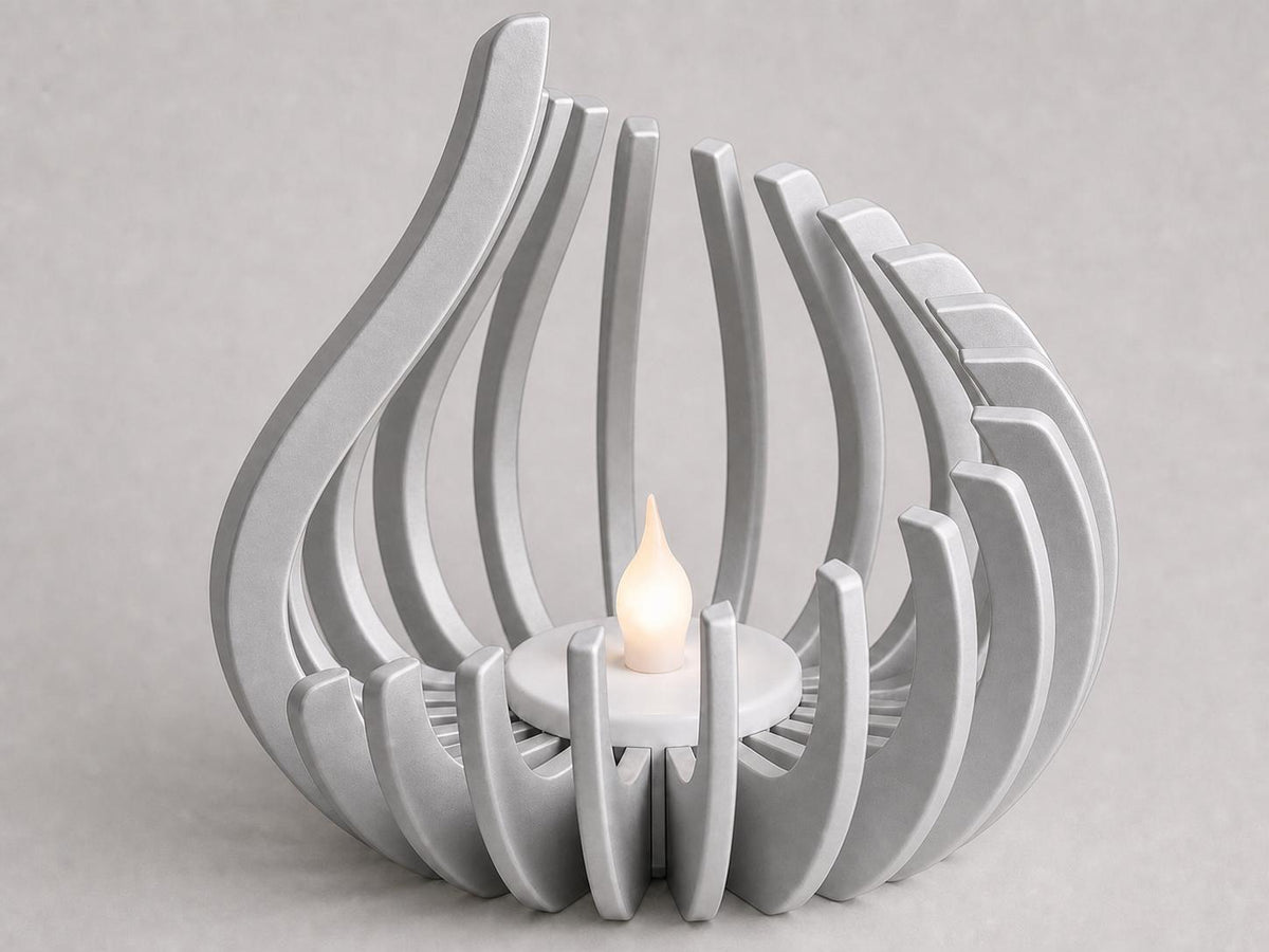 Silver FlareNest wedding centerpiece from a raised angle showing the fitted LED tealight and open ribs